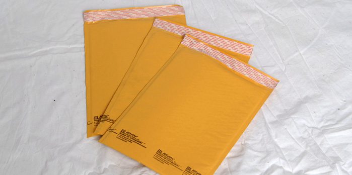3 brown security envelopes